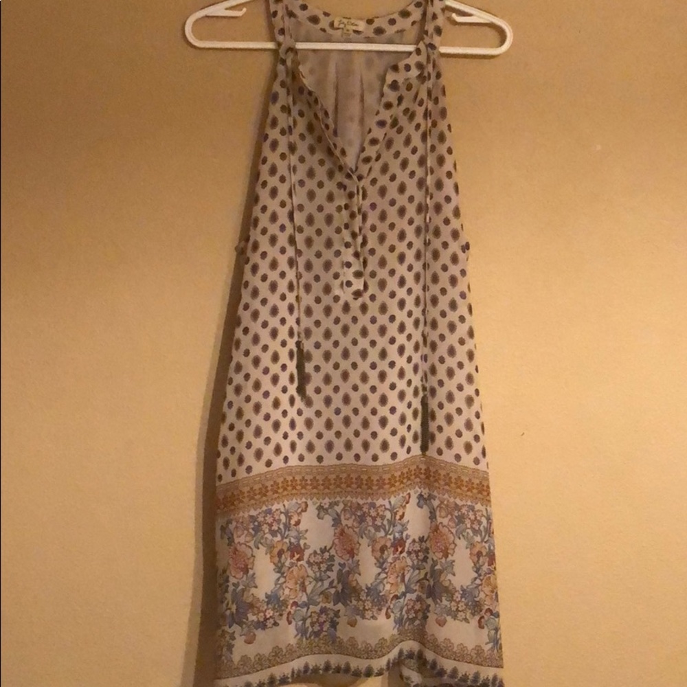Muti pattern shirt or dress with leggings.
